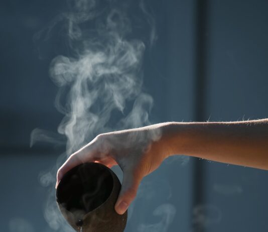 일상 속 마음 건강 지키기, 작은 습관이 큰 변화를 만든다 person pouring hot water on white cup