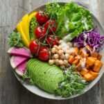 “건강한 삶의 동반자, 항염 식단으로 염증과 작별을!” bowl of vegetable salads